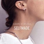 NOJ jewelery selfmade with a woman on the background